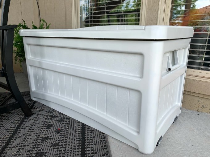 Spray painted outdoor patio storage box with Rustoleum Paint and Primer Spray Paint.
