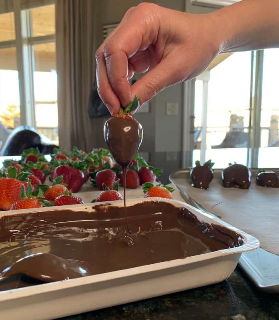 dipping strawberries in chocolate
