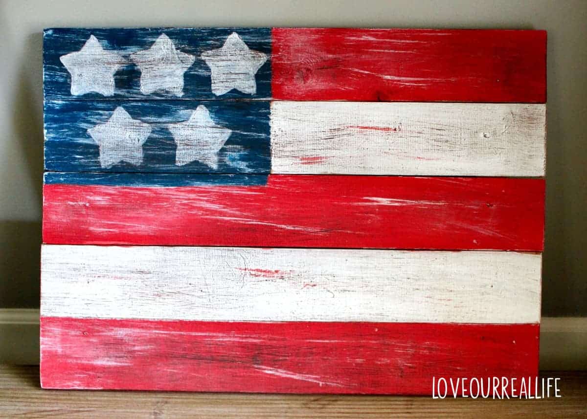 Patriotic rustic wooden flag sign of the United States.
