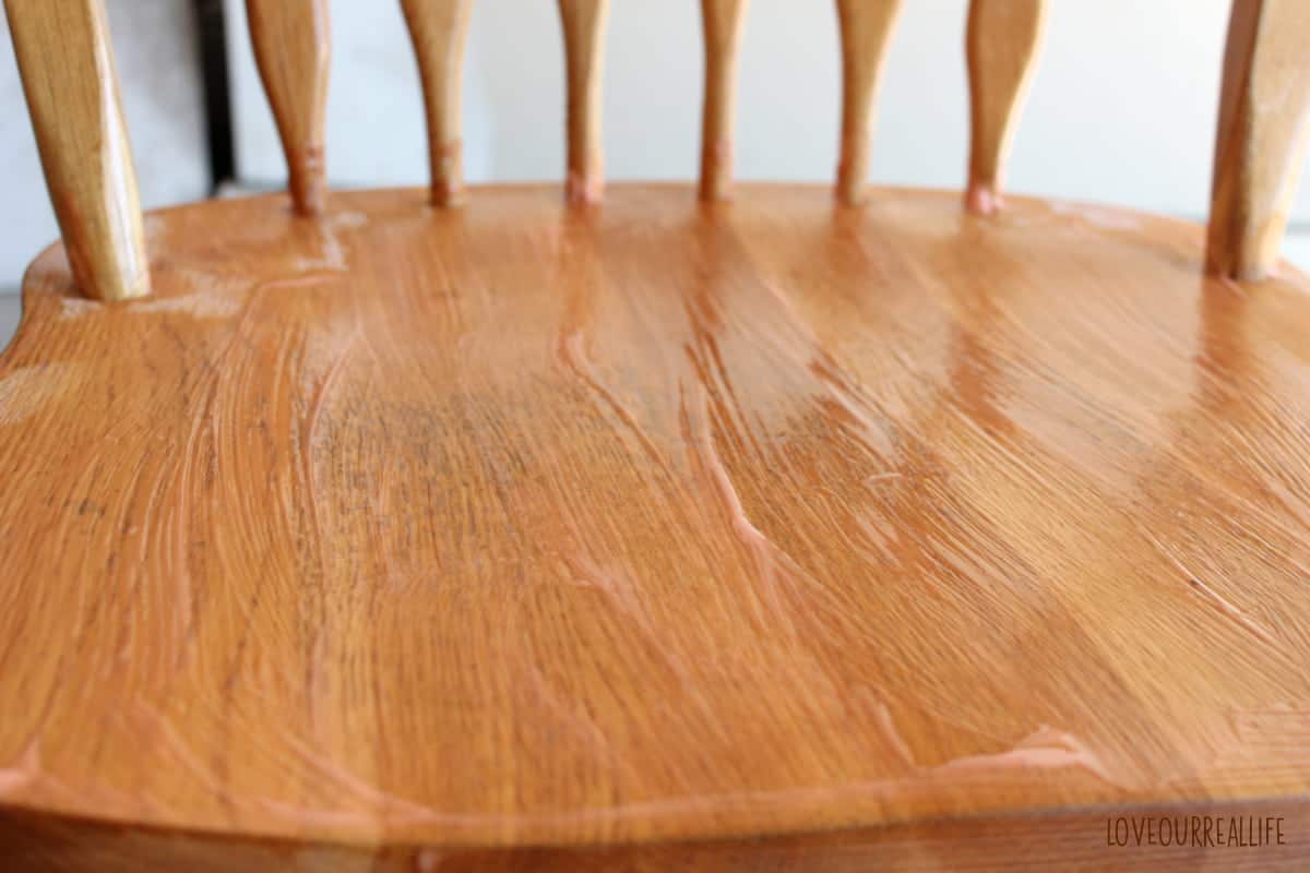 Citristrip gel removing wood stain on chair.