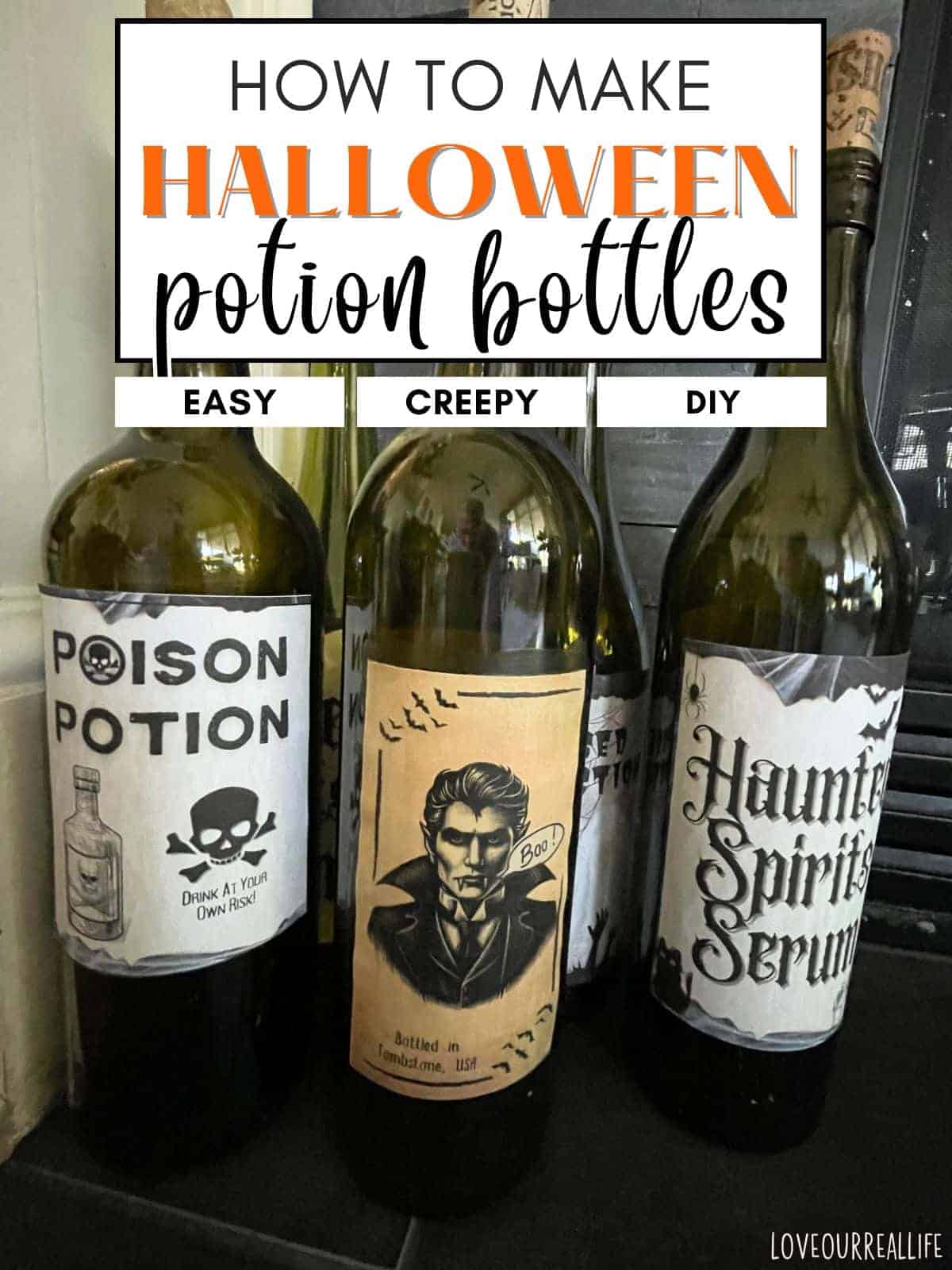 Three wine bottles with halloween labels.