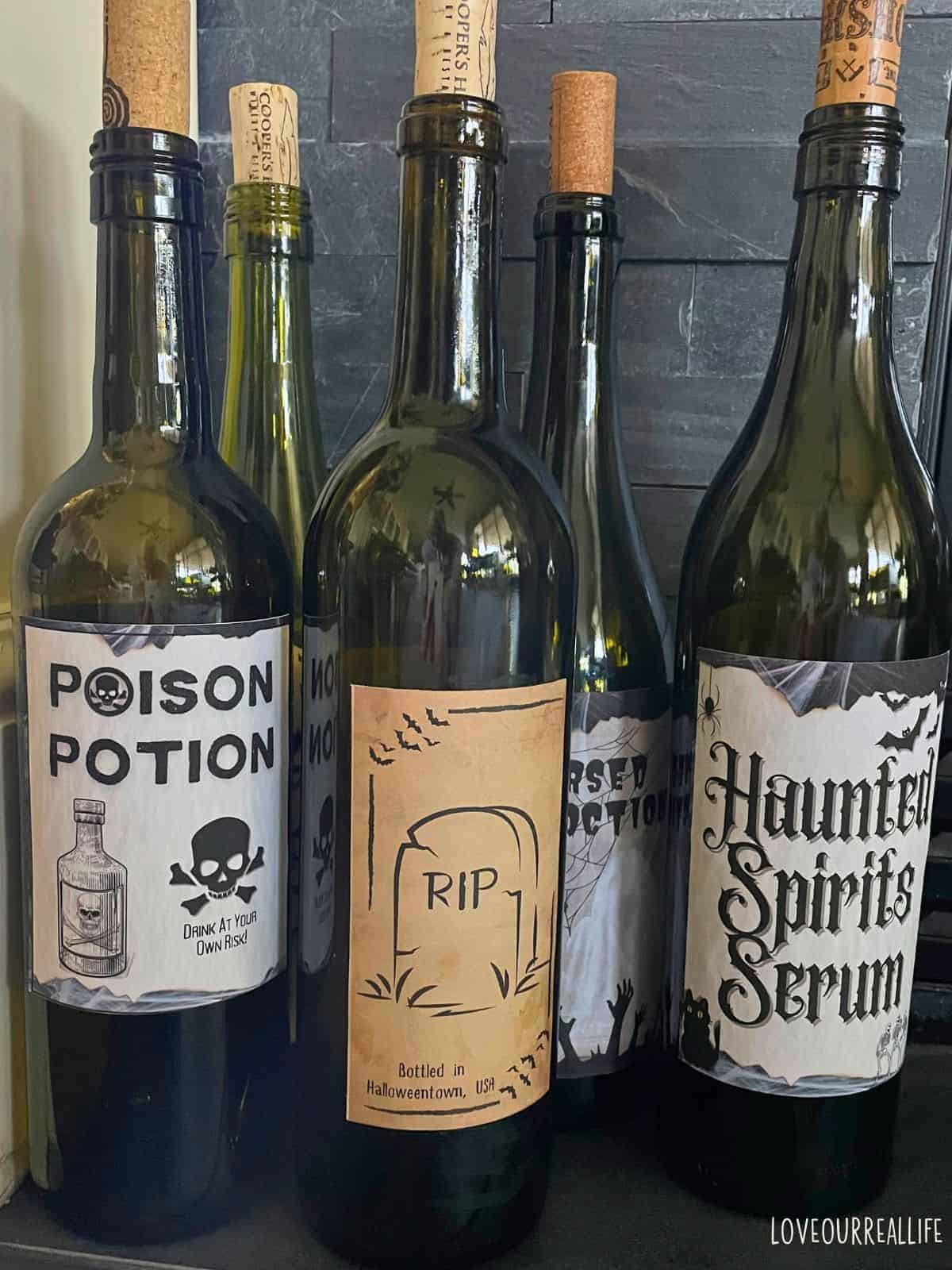 Halloween DIY potion bottles made with old wine bottles.